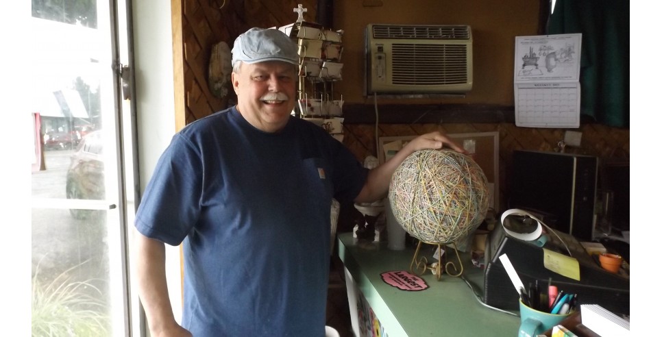 Norman Mackey with his rubber band ball - courtesy of Barbara McMichael Norman Mackey with his rubber band ball - courtesy of Barbara McMichael